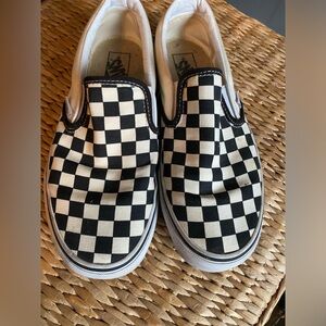 Women’s checked slip on Vans.